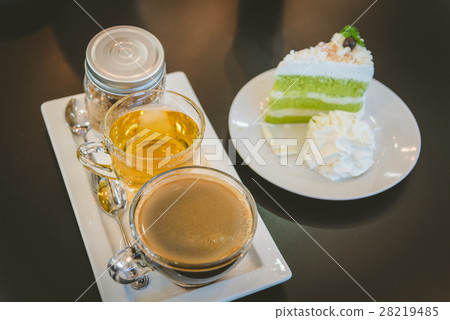 Hot coffee and cake. Hot coffee and cake. 28219485