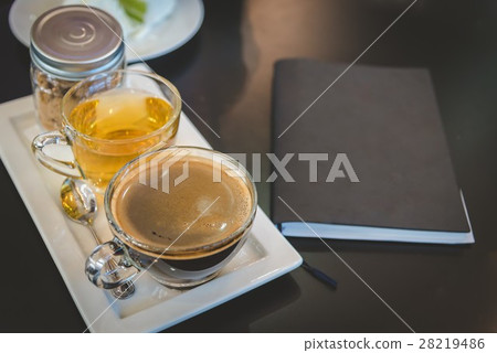 Hot coffee and cake. Hot coffee and cake. 28219486