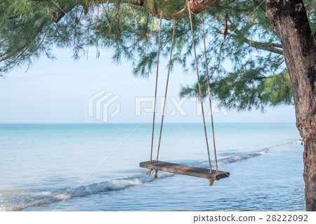 wooden swing seat hanging on the beach 28222092