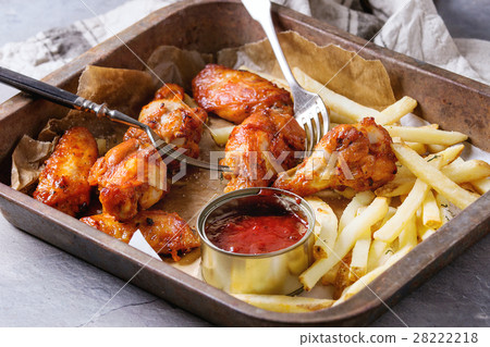 Fried chicken legs with french fries 28222218