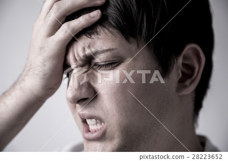 Man holding his head Man holding his head 28223652