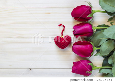 Roses and red heart on wooden background for val 28223734