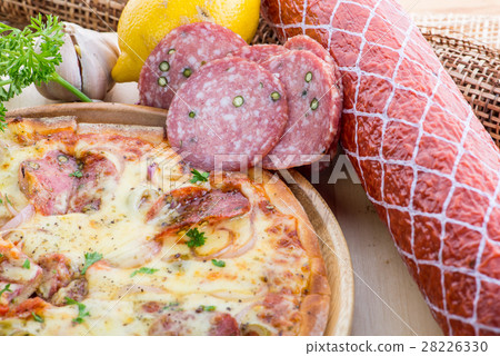 ITALIAN PIZZA on wooden table.hot tasty salami 28226330