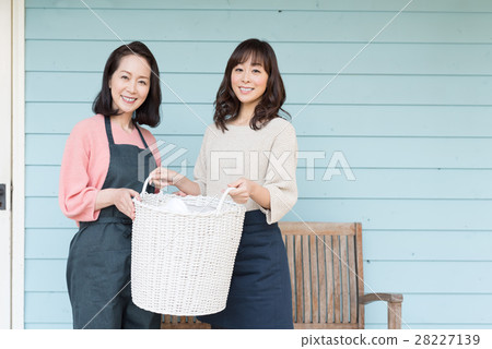 Mother and daughter washing Mother and daughter washing 28227139