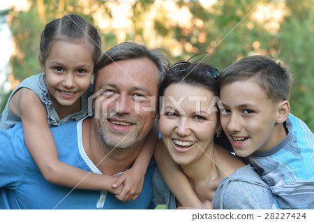 Family resting in summer park Family resting in summer park 28227424