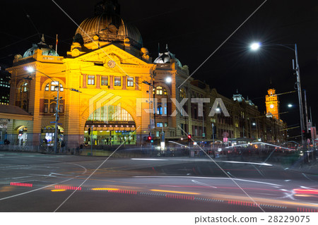 Flinders street station in Melbourne with traffic Flinders street station in Melbourne with traffic 28229075
