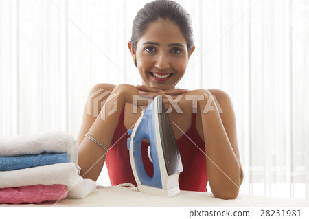 young woman ironing  28231981