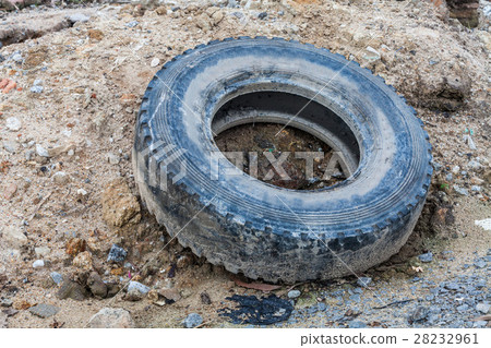 Old tire indicating breeding ground for mosquito 28232961