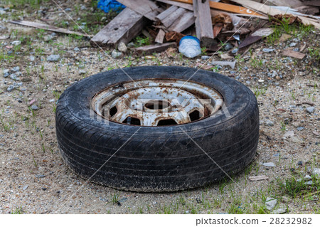 Old tire indicating breeding ground for mosquito 28232982