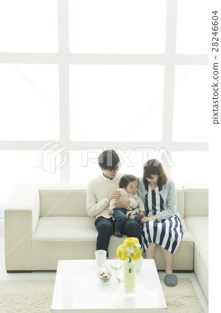 Three families sitting on the sofa 28246604