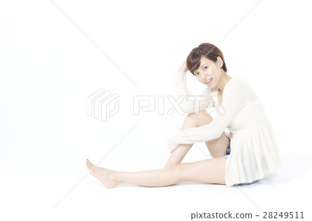 A young lady in a relaxing pose 28249511