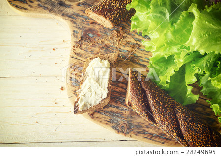 breakfast: sandwich with cheese and lettuce 28249695