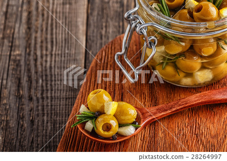 Fresh olives with rosemary, garlic, lemon. Fresh olives with rosemary, garlic, lemon. 28264997
