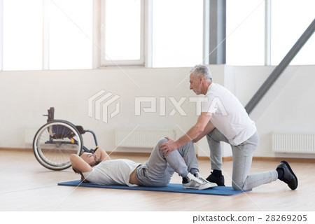 Kindly general practitioner stretching the Kindly general practitioner stretching the 28269205