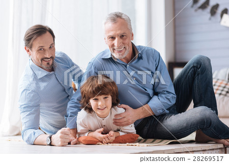 Nice cute child lying on the cushion 28269517