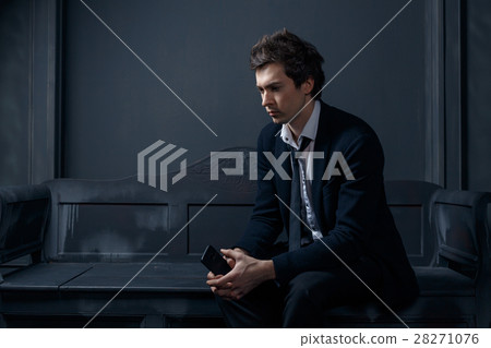 Man in the black suit 28271076