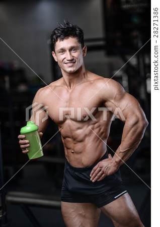 Handsome bodybuilder training in the gym sexy m Handsome bodybuilder training in the gym sexy m 28271386