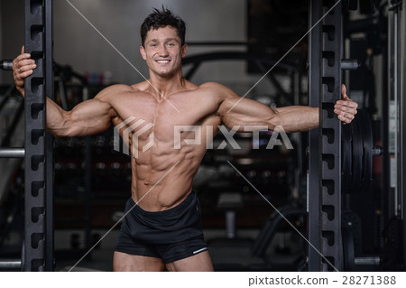 Handsome bodybuilder training in the gym sexy m Handsome bodybuilder training in the gym sexy m 28271388