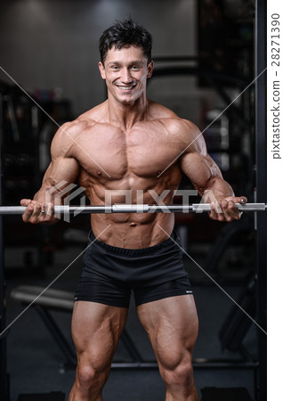Handsome bodybuilder training in the gym sexy m Handsome bodybuilder training in the gym sexy m 28271390