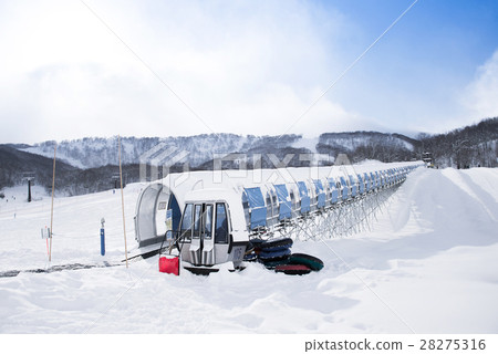 Skiing escalator or moving walkway Skiing escalator or moving walkway 28275316