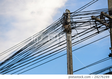 Old electricity post against blue sky with cloud Old electricity post against blue sky with cloud 28276289
