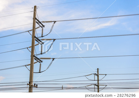 Old electricity post against blue sky with cloud 28276296