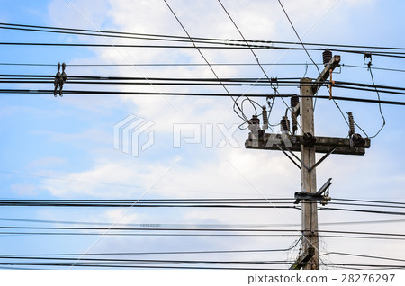 Old electricity post against blue sky with cloud Old electricity post against blue sky with cloud 28276297