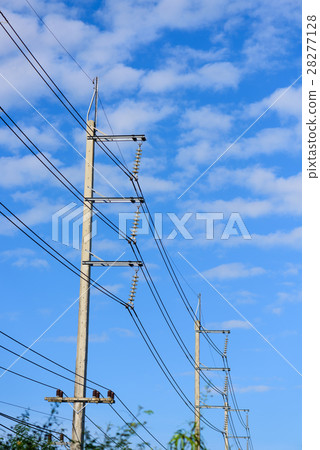 Electricity post against blue sky with cloud Electricity post against blue sky with cloud 28277128
