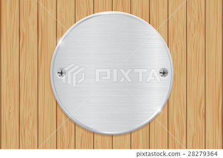 Round metal plate on wooden background 28279364