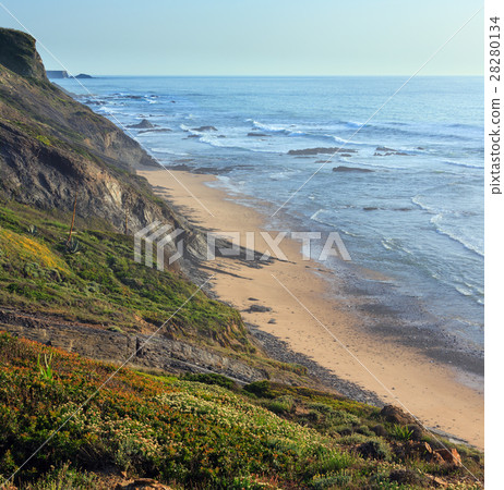 Evening ocean beach (Algarve, Portugal). 28280134