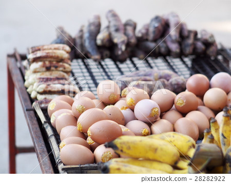 grilled eggs, banana, sweet potato sale on street grilled eggs, banana, sweet potato sale on street 28282922