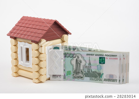 From the open door house sticks out a pack of thousandths Russian banknotes From the open door house sticks out a pack of thousandths Russian banknotes 28283014