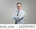 Attractive business man portrait on gray 28283465