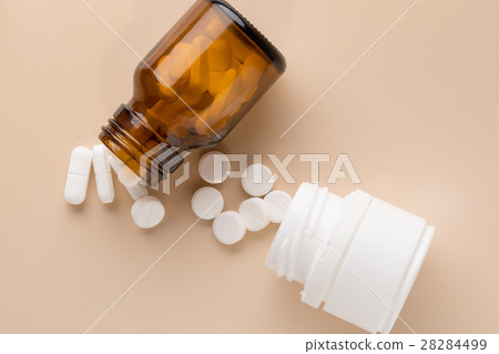 Glass and plastic pills bottle Glass and plastic pills bottle 28284499