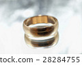 Old golden ring on a gray background 28284755
