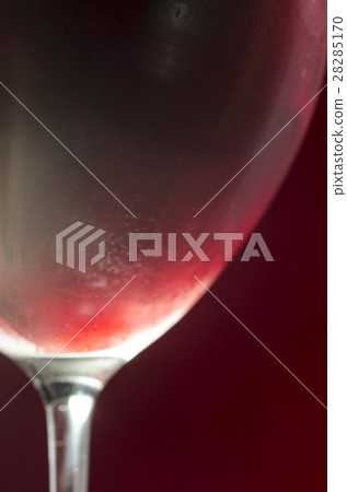 Wineglass with cold red wine Wineglass with cold red wine 28285170