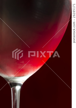 Wineglass with cold red wine 28285171