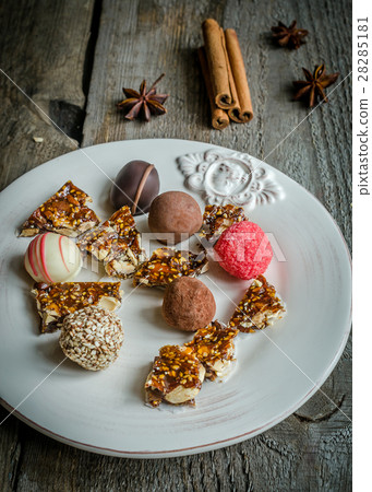chocolate candies with turron pieces chocolate candies with turron pieces 28285181