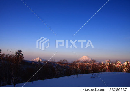 Mt. Yotei winter in the morning sun and Mt. 28286587