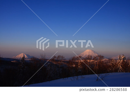 Mt. Yotei winter in the morning sun and Mt. 28286588