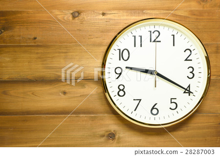 wall clock on the wooden wall wall clock on the wooden wall 28287003
