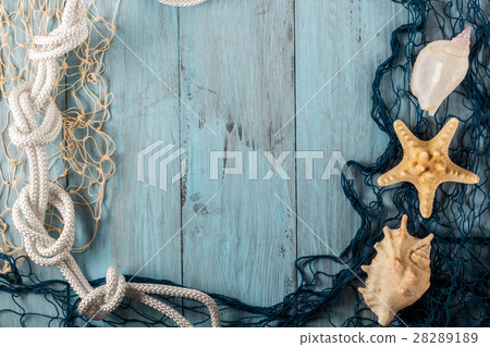 Marine Network and shells on blue boards Marine Network and shells on blue boards 28289189