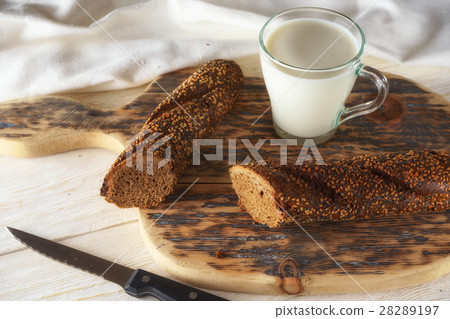 breakfast: glass of milk and loaf breakfast: glass of milk and loaf 28289197