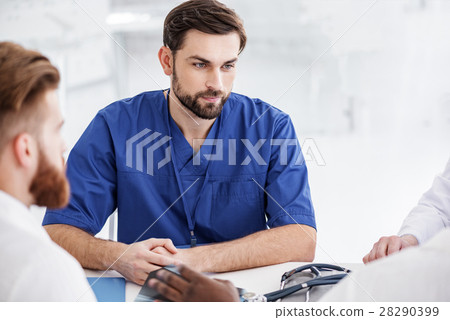 Outgoing doctor situating with colleagues during Outgoing doctor situating with colleagues during 28290399