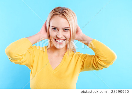 Flirty young woman posing and laughing 28290930