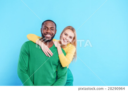 Cheerful loving couple embracing with joy 28290964