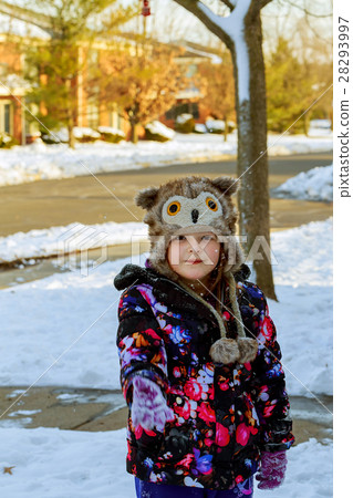 cute little girl is going skate outdoors 28293997