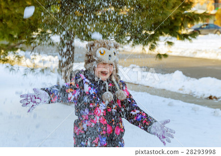 Winter snow little girl playing with snow 28293998