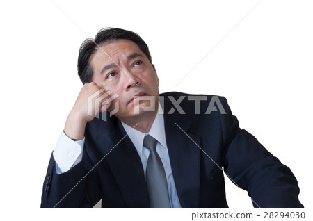 Middle-aged office worker who thinks seriously Middle-aged office worker who thinks seriously 28294030