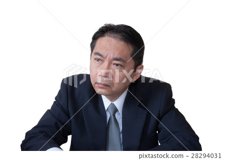 Middle-aged office worker who thinks seriously 28294031